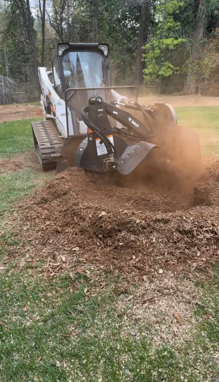 Skid steer stump grinding